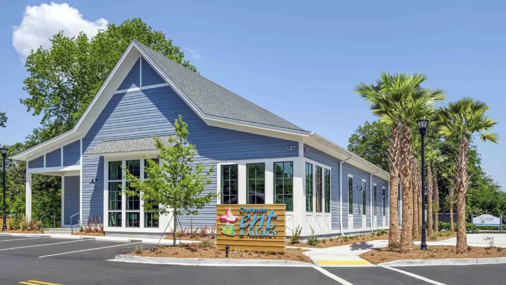 ENT allergy building on Folly Road beside palmetto trees